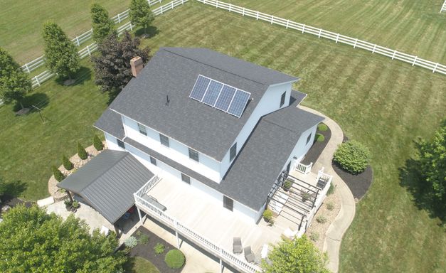 residential home with shingle roof
